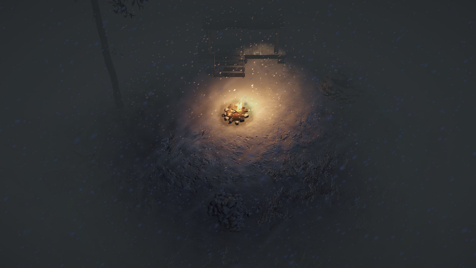 The same spot in a blizzard at night, dark all round except the warm glow of the campfire.