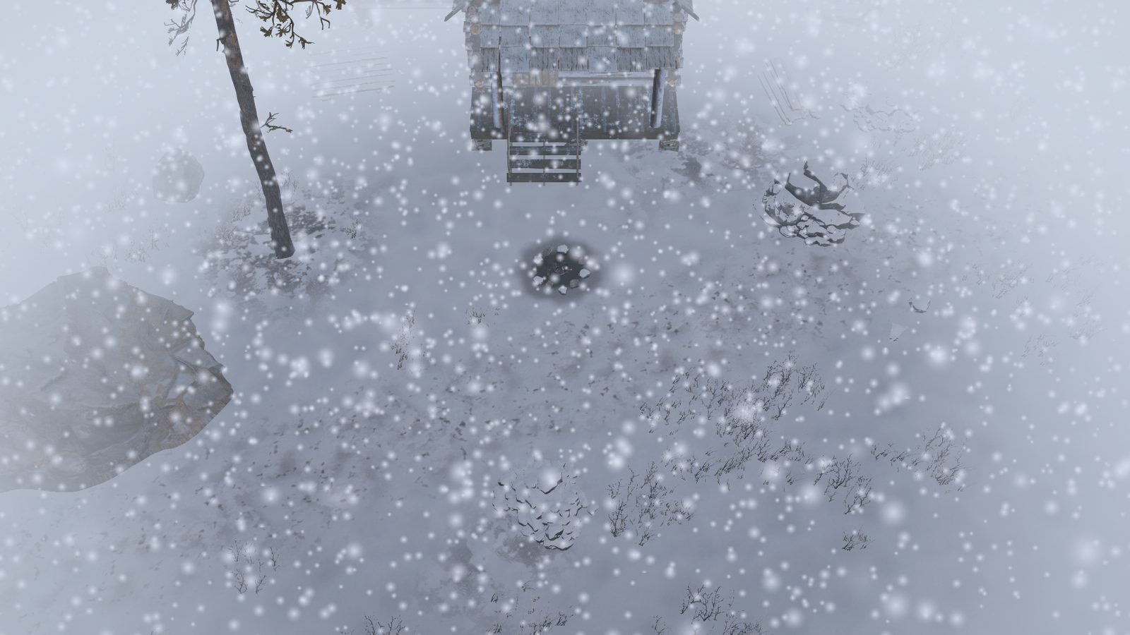 The same spot in heavy snow, thick flakes and a white haze round the edges.